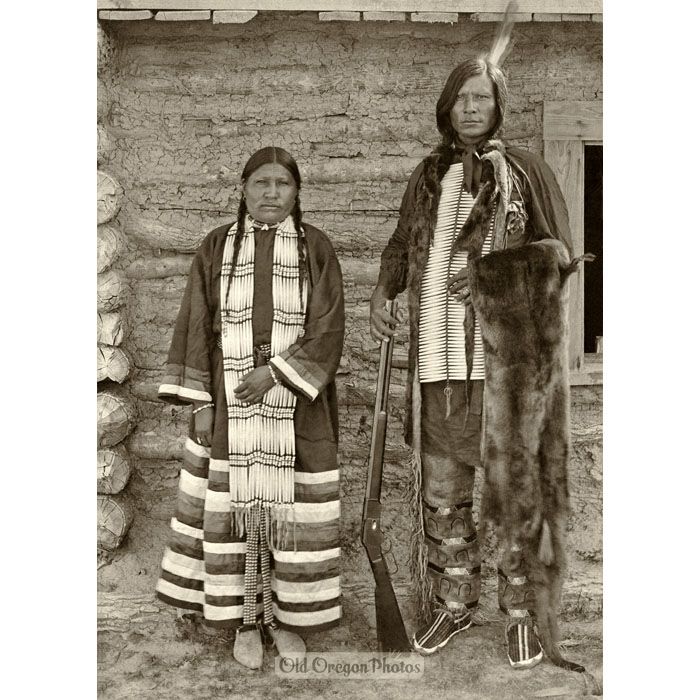 Colville Couple, with Winchester Rifle and River Otter Pelt